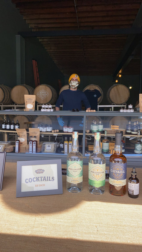The booth Catskill Provisions staff set up Memorial Day weekend in Callicoon—the tasting room's soft opening mid pandemic. ..